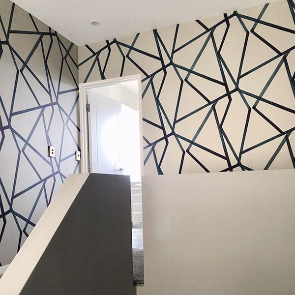 Feature wall wallpaper installation in Queenstown